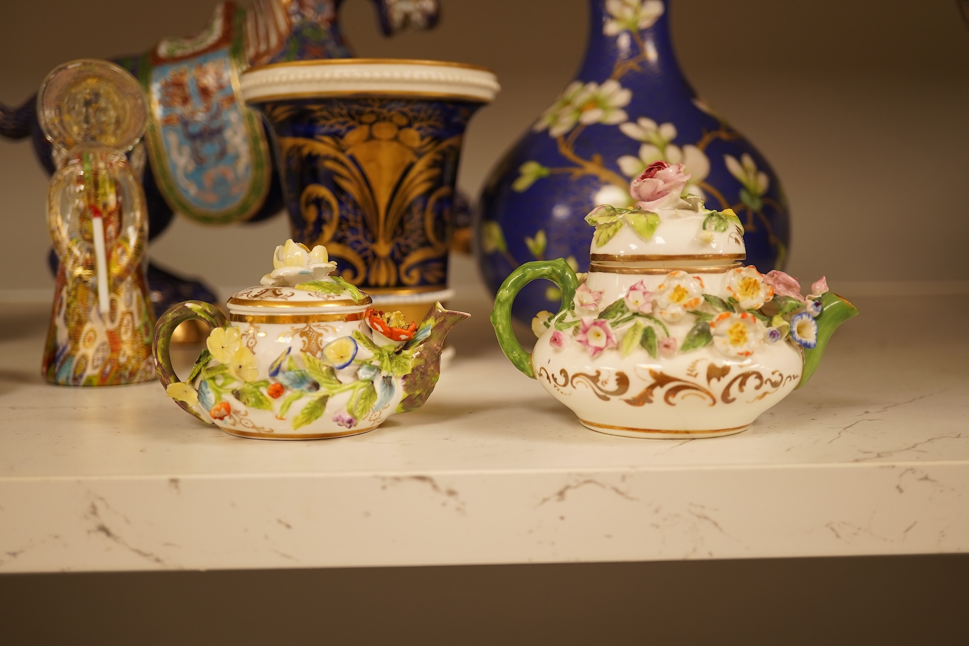 A Chinese cloisonné enamel horse and vase, two miniature Rockingham floral teapots, a malachite box etc (9). Cloisonné horse 20cm long.